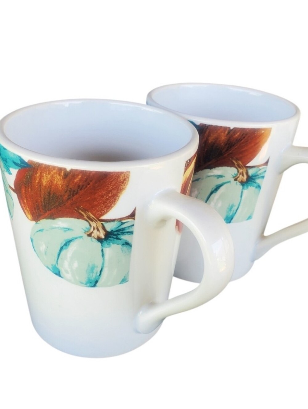 White Ceramic Mug with Teal Pumpkin Artwork - Set of 2